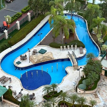 Flat Com Vista Panoramica -15- Na Barra Da Tijuca - Estacionamento Gratuito - Frigobar - Ar Condicionado - Piscina - Academia - Balsa Para Praia Gratis - Varanda - Vista Parcial Mar E Lagoa Rio de Janeiro Kültér fotó