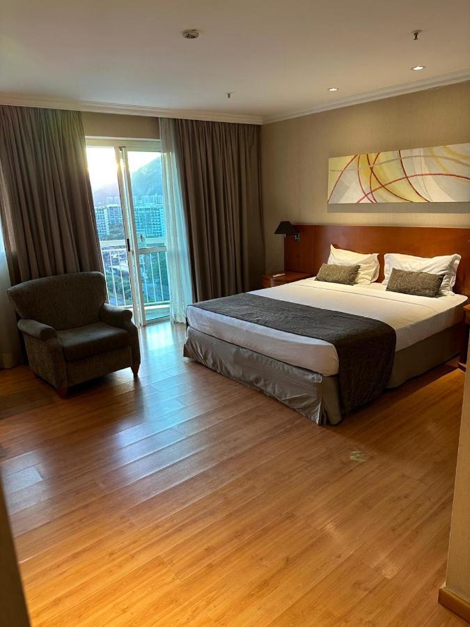 Flat Com Vista Panoramica -15- Na Barra Da Tijuca - Estacionamento Gratuito - Frigobar - Ar Condicionado - Piscina - Academia - Balsa Para Praia Gratis - Varanda - Vista Parcial Mar E Lagoa Rio de Janeiro Kültér fotó