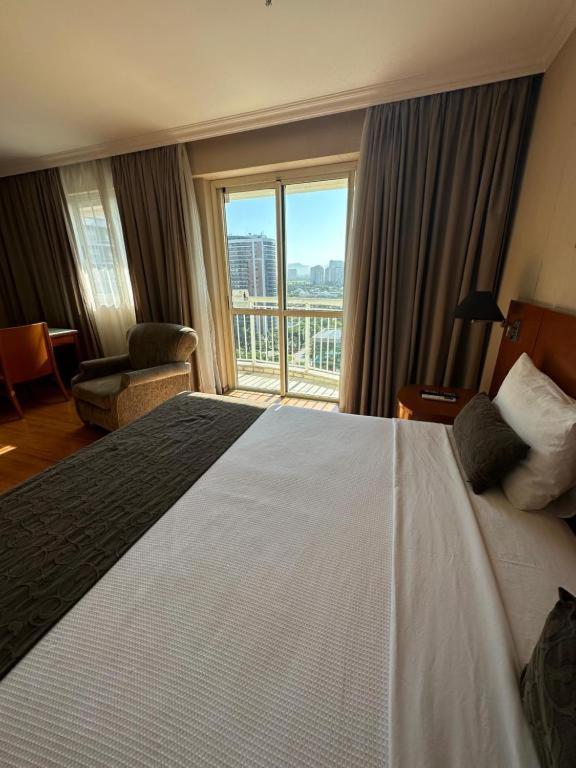 Flat Com Vista Panoramica -15- Na Barra Da Tijuca - Estacionamento Gratuito - Frigobar - Ar Condicionado - Piscina - Academia - Balsa Para Praia Gratis - Varanda - Vista Parcial Mar E Lagoa Rio de Janeiro Kültér fotó